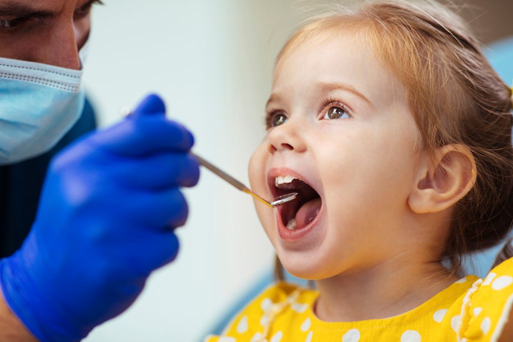 little girl at dentist